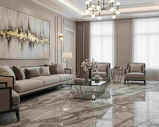Contemporary living room with large windows at Kalpataru Amare Juhu